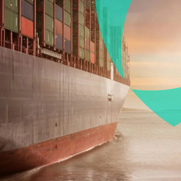 Large container ship at sea carrying global cargo, representing marine claims handling and survey services.